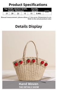 Detailed view of handmade straw basket bag featuring red crochet strawberry decorations
