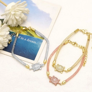 Minimalist turtle pendant mesh bracelets in gold, silver, and rose gold with zircon