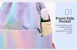 Detail view of rainbow drawstring backpack showing front zipper pocket and side umbrella pocket