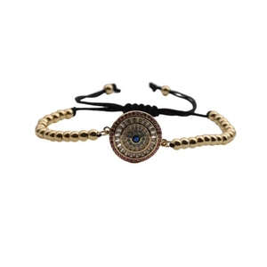 Turkish Evil Eye bracelet with gold beaded chain and adjustable black braided cord strap
