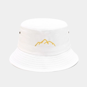 Detail of white washed cotton bucket hat featuring yellow mountain embroidery and eyelets