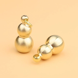 Traditional golden brass Wu Lou gourd pendants for wealth and prosperity feng shui decor