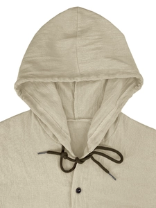Detailed view of khaki cotton linen hooded shirt with dark drawstring and button