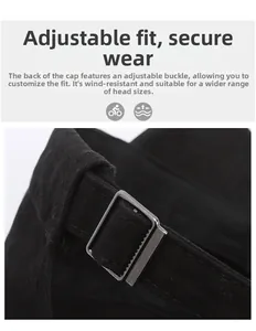Detail of adjustable metal buckle on black canvas cap for custom fit and stability