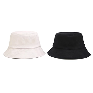 Detail view of cotton bucket hats in black and white with reinforced stitched brim