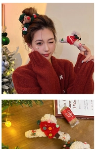 Detail showing plush Christmas hair accessories with Santa and reindeer motifs