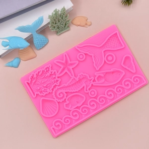 Pink silicone marine life mold for ocean themed cake toppers and DIY chocolates