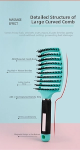 Detail of mint green curved hairbrush with boar bristles and magnetic handle base
