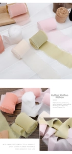 Macro detail of frayed edge chiffon ribbons in soft pastel tones for gift packaging