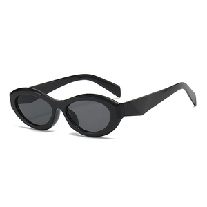 Retro oval black thick frame sunglasses with dark grey lenses for a vintage fashion look