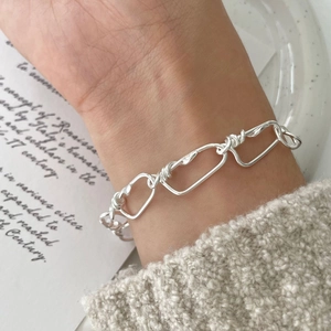 Minimalist 925 sterling silver hand-woven link bracelet with unique spiral wire detail