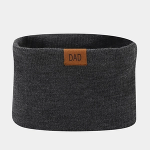 Detail of dark grey knitted neck warmer featuring a leather patch with DAD lettering