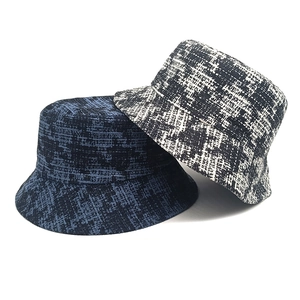 Classic houndstooth bucket hats in navy and black-white tweed for winter fashion