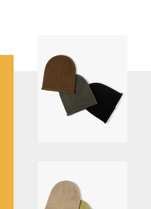 Detailed knit texture of soft thick beanies in various autumn colors and neutral tones