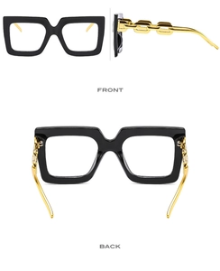 Detailed front and side views of large square black eyewear with gold chain temples