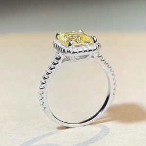S925 sterling silver ring featuring a radiant cut yellow zircon with halo diamonds