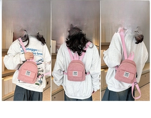 Three-way pink corduroy mini backpack showing crossbody, shoulder, and back carry modes
