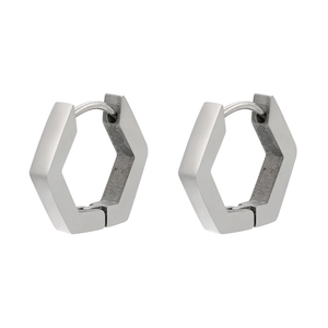 Detailed macro view of silver hexagonal earrings with a brushed stainless steel finish