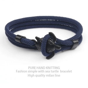 Blue braided milan line sea turtle bracelet with black anchor style charm for couples