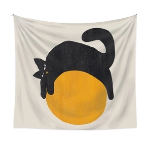 Minimalist cat silhouette tapestry with orange sun motif on a cream fabric background