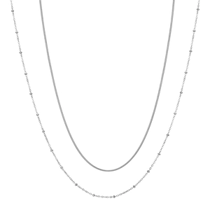 Minimalist silver double-layered necklace featuring a sleek snake chain and delicate beads