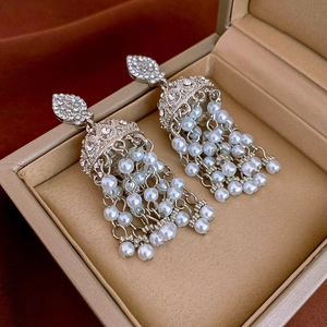 Vintage palace style earrings with sparkling rhinestones and elegant pearl tassels