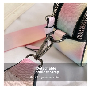 Detail of the detachable shoulder strap with black metal hook on gradient camera bag
