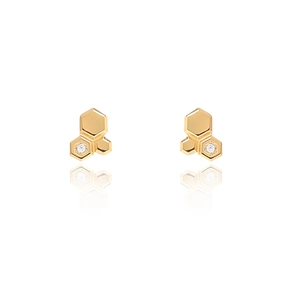 Macro detail of gold-plated titanium steel honeycomb stud earrings with cubic zirconia