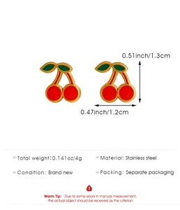 Detail view of red cherry earrings showing 1.3cm height and stainless steel material