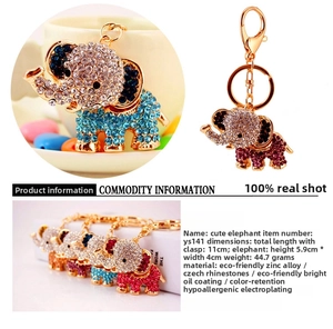 Detail of creative crystal elephant keychain showing rhinestones and golden lobster clasp