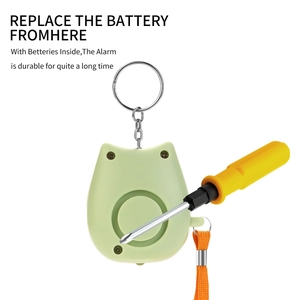 Detail showing how to replace batteries in the cat-shaped personal alarm using a screwdriver