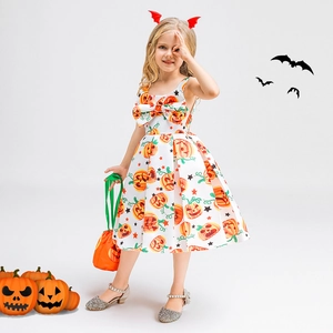 Detail of girls Halloween pumpkin print princess dress with orange bow and bat decor