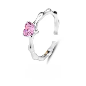 Detailed close-up of S925 sterling silver ring with pink heart stone and bamboo texture