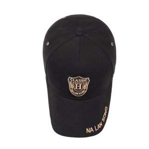 Classic black baseball cap with gold embroidery and adjustable structured cotton crown