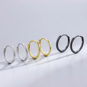 S925 sterling silver hoop earrings in silver, gold, and black finishes on grey background