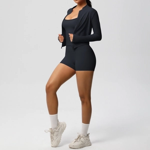 Three-piece black yoga set with slim fit zipper jacket, tank top, and high-waist shorts
