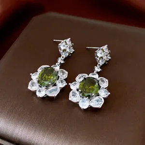 Luxury silver flower drop earrings featuring olive green zircon in a vintage royal style
