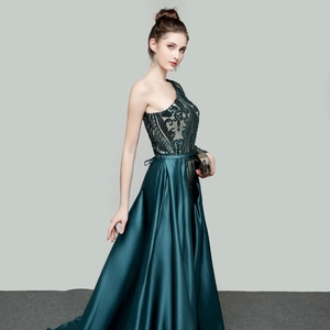 Elegant one-shoulder dark green sequined evening gown with mermaid satin skirt