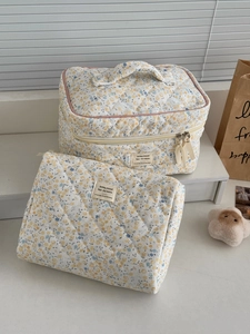 Trousse de maquillage matelassée en velours côtelé à fleurs jaunes avec poignée