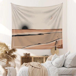 Detailed view of bohemian tapestry with sun and moon pattern in a cozy bedroom setting
