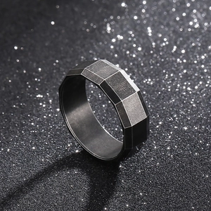 Men's dark style faceted titanium steel ring with black brushed texture and geometric design