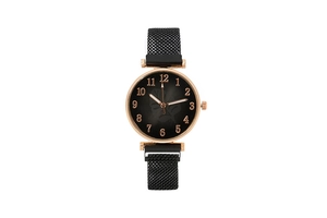 Detailed view of women's watch with black magnetic mesh strap and rose gold leaf dial