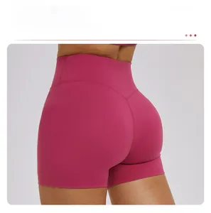 Close-up of high-waisted yoga shorts with butt-lifting seam and wide waistband