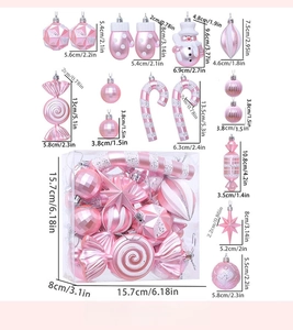 Detailed pink Christmas ornament set featuring star, candy, and ball shapes in a box