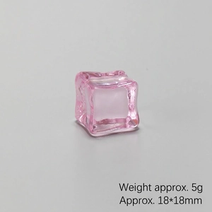 Detail of pink transparent 18mm resin ice cube prop weighing 5g with glossy finish