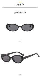 Front and 45-degree side view of vintage oval sunglasses with black frames and dark lenses