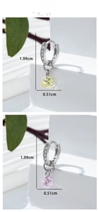 Detail view of heart zircon earrings showing 1.99cm height and 0.51cm width measurements