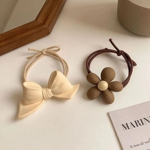 Korean style bow and flower hair ties in beige and coffee brown matte resin finish