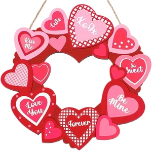 Valentine wooden heart wreath with Kiss Me and Love You inscriptions for home wall decor