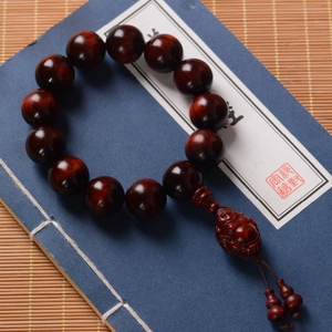 Polished red sandalwood prayer beads with Maitreya Buddha carving and gourd charms